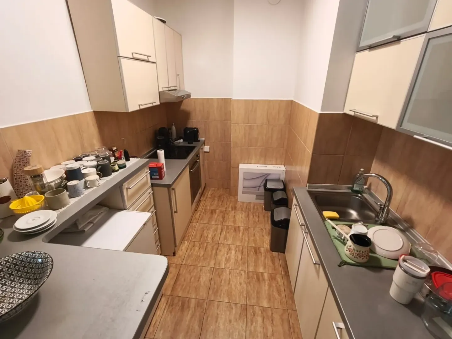 Kitchen with fitted units and a sink.