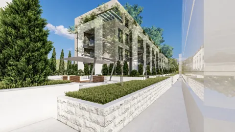 Spoljašnji izgled moderne stambene zgrade sa uređenim dvorištem i zelenilom. - image 2