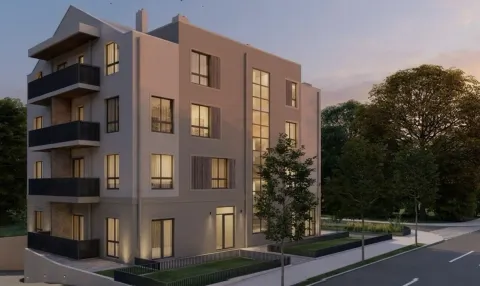 Exterior of a modern apartment building at dusk. - image 3