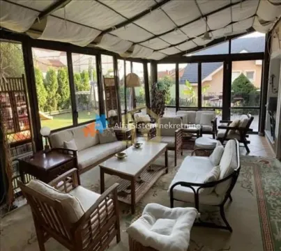 Enclosed terrace with seating set and view of the yard. - image 3