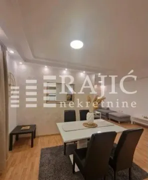 Living room with dining area and modern furniture. - image 4