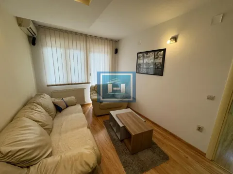 Living room with a sofa set and a coffee table. - image 3