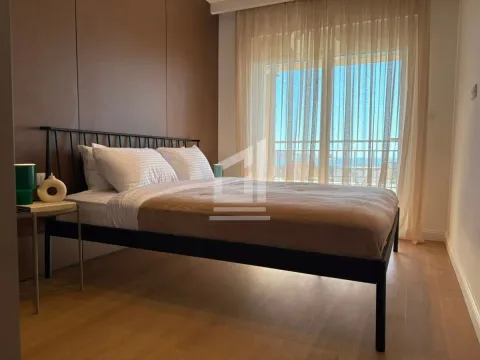 Furnished bedroom with a double bed and access to the terrace. - image 6