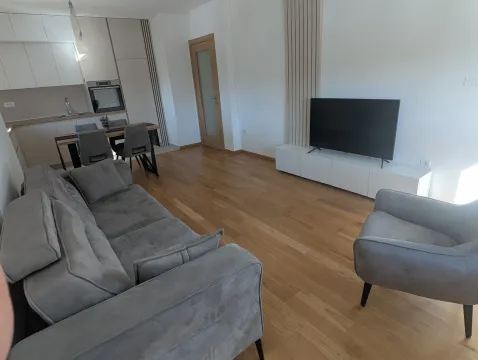 Spacious living room connected to the dining area and kitchen. - image 12