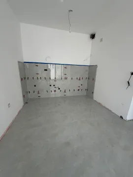 Unfinished kitchen with installed tiles and prepared plumbing and electrical installations. - image 11