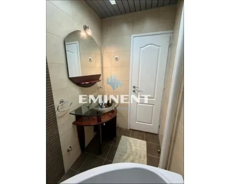 Small tiled bathroom with a washbasin and a mirror. - image 14