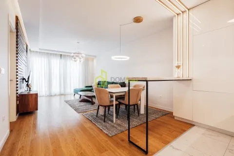 Spacious living room with a dining area and modern furniture. - image 7
