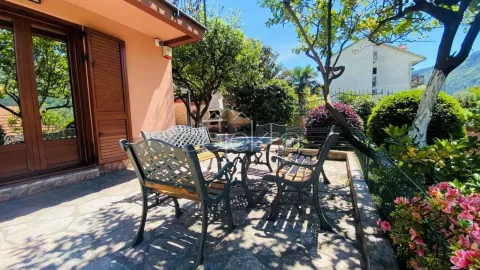 Terrace with seating furniture in the courtyard of the house. - image 7