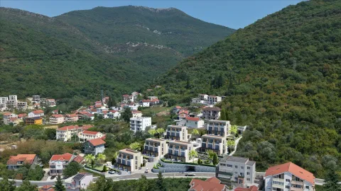 Pogled iz vazduha na novoizgrađeni stambeni kompleks u zelenom okruženju. - image 5