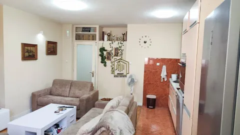 Living room connected with the kitchen in an open space layout. - image 3