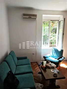 Living room with a sofa set and a coffee table. - image 3