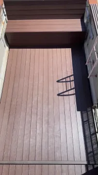 Terrace with wooden flooring and stairs. - image 15