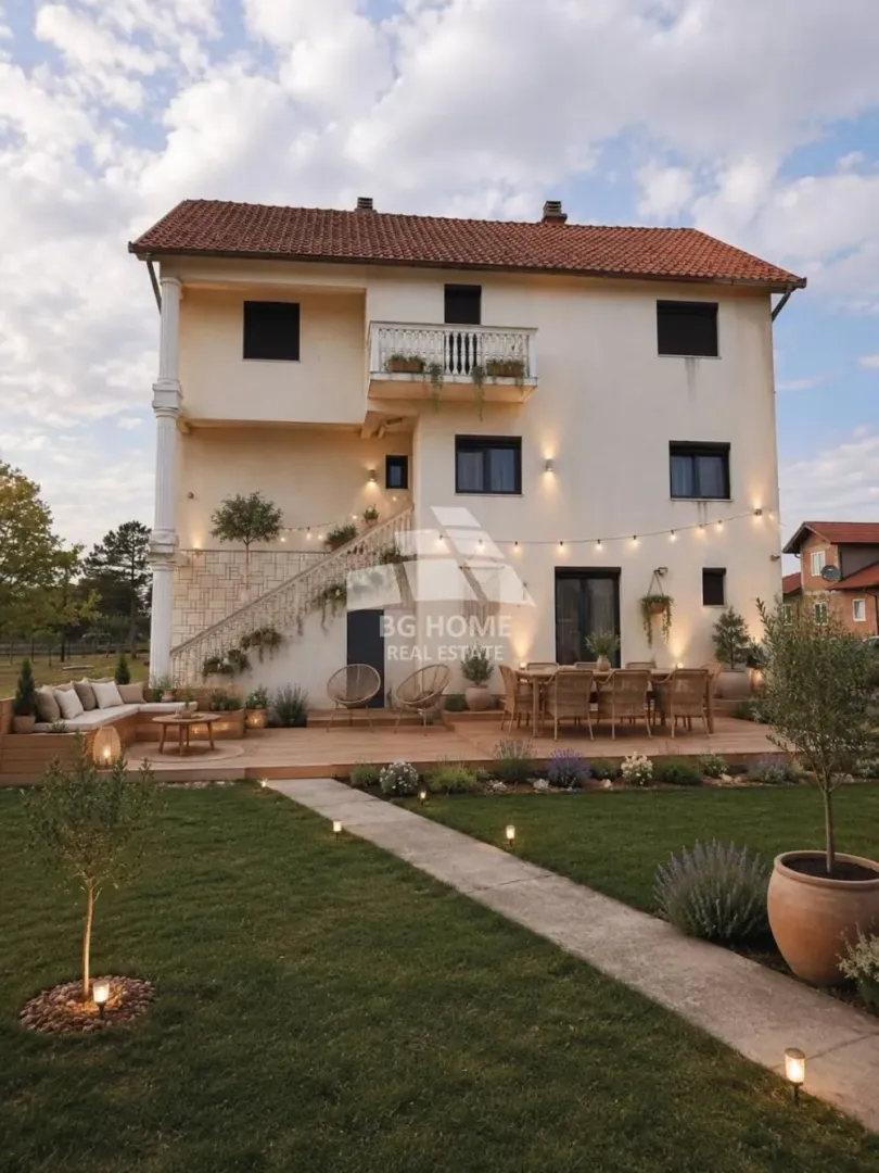 View of the exterior of the house with a landscaped yard and terrace.