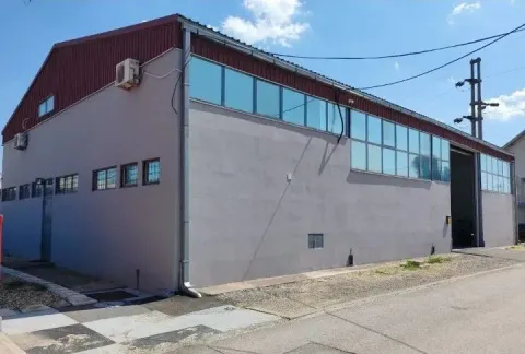 Exterior view of a commercial building or warehouse. - image 3