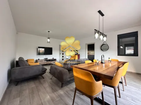 Spacious living room with a dining area and modern furniture. - image 2