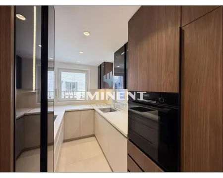 Modern fitted kitchen with wooden elements. - image 7