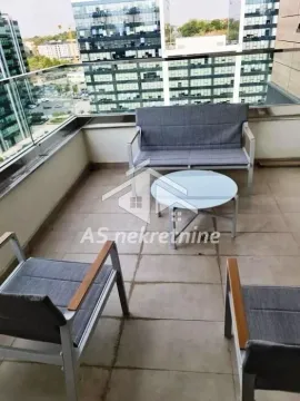 Furnished terrace with seating furniture and city view. - image 18