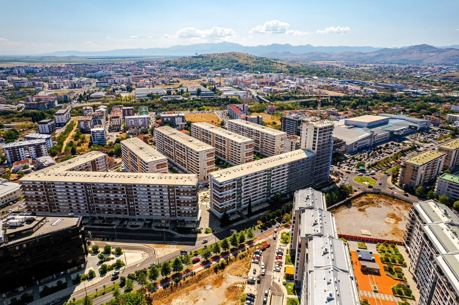 Aerial view of the residential complex and surrounding neighborhood.
