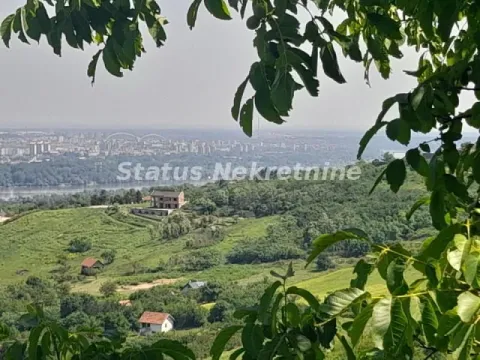 View from the property of the surrounding landscape and distant city through branches. - image 16