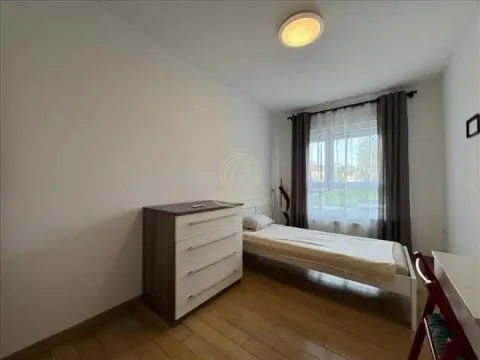 Smaller bedroom with a bed, dresser, and a window. - image 8
