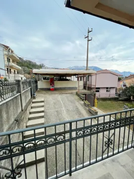 View of the driveway, parking area, and yard from the terrace. - image 14