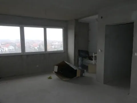 View of an unfinished room under construction with a large window. - image 9