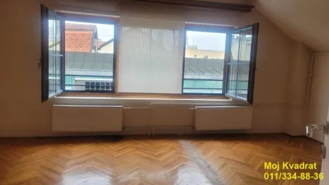 Empty room with parquet flooring and open windows. - image 5