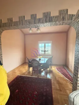 Dining area with a dining table and chairs overlooking the window. - image 6