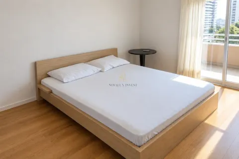 Bedroom with a double bed and wooden flooring. - image 6