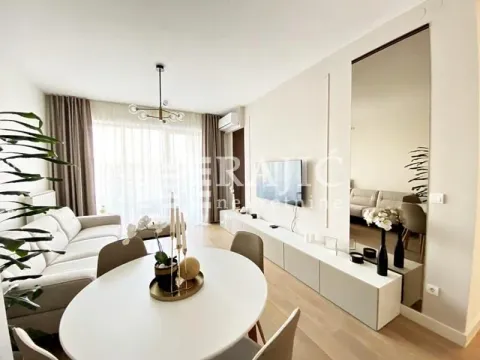Modern living room with dining area and large windows. - image 6