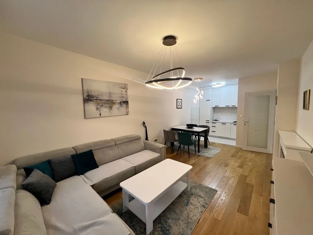 Living room connected to the dining area and kitchen.