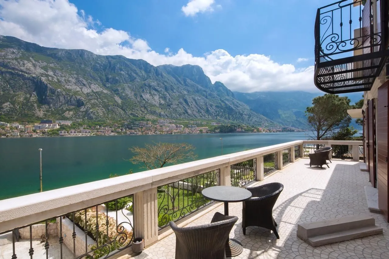 Spacious terrace with seating furniture and an open sea view.