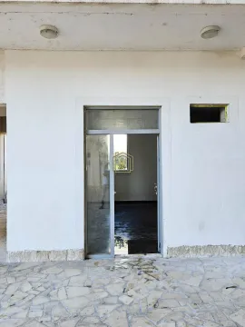 View of the entrance door and building facade. - image 2