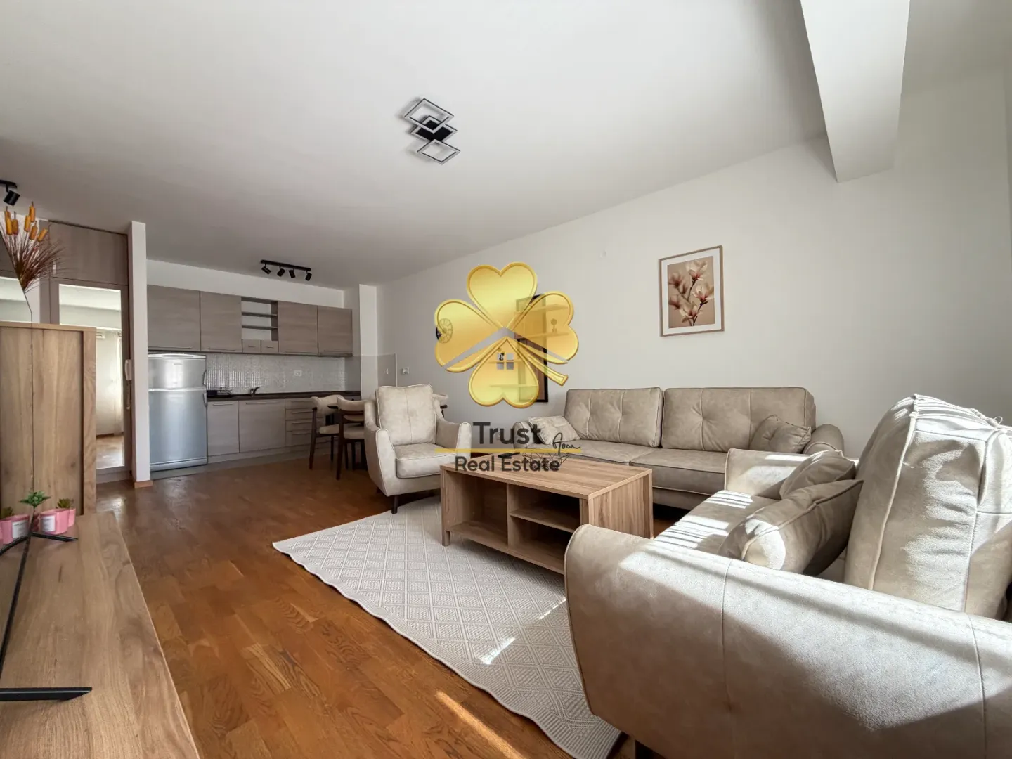 Spacious living room connected with the kitchen and dining area.