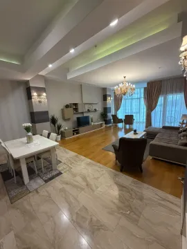 Spacious living room connected to the dining area. - image 9