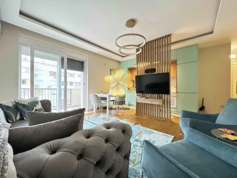 Modern and bright living room with a sofa set and dining area. - image 2