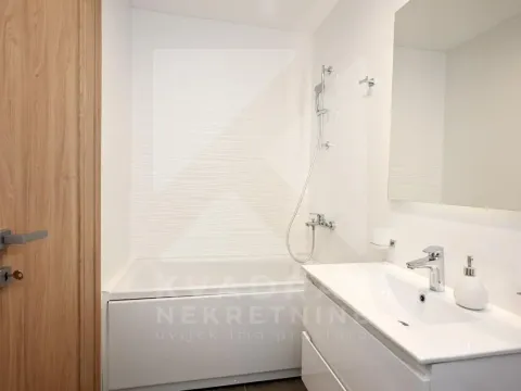 Rent, two bedroom apartment, 70m², Master Kvart, Podgorica - image 11