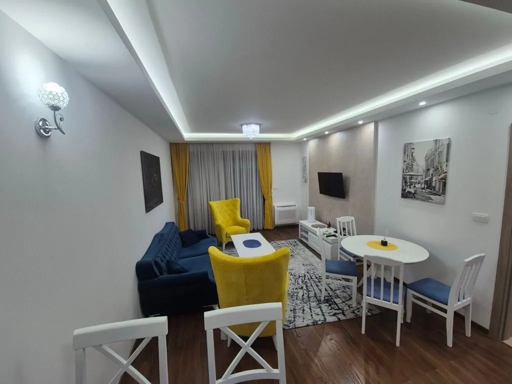 Spacious living room with a dining area and modern furniture.