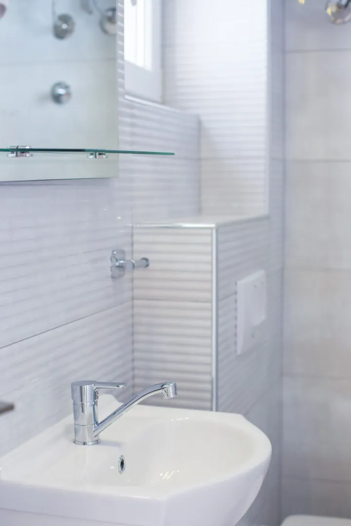 Modern bathroom with a sink and a mirror.