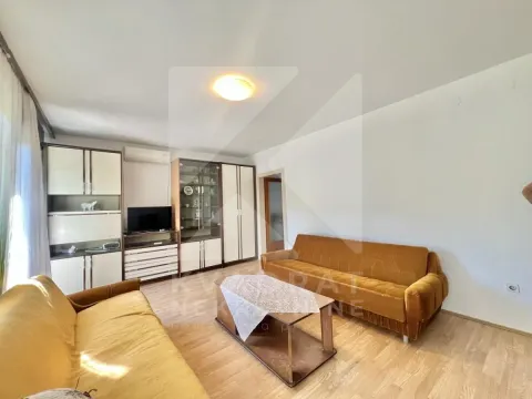 Living room with seating furniture, coffee table and cabinetry. - image 3