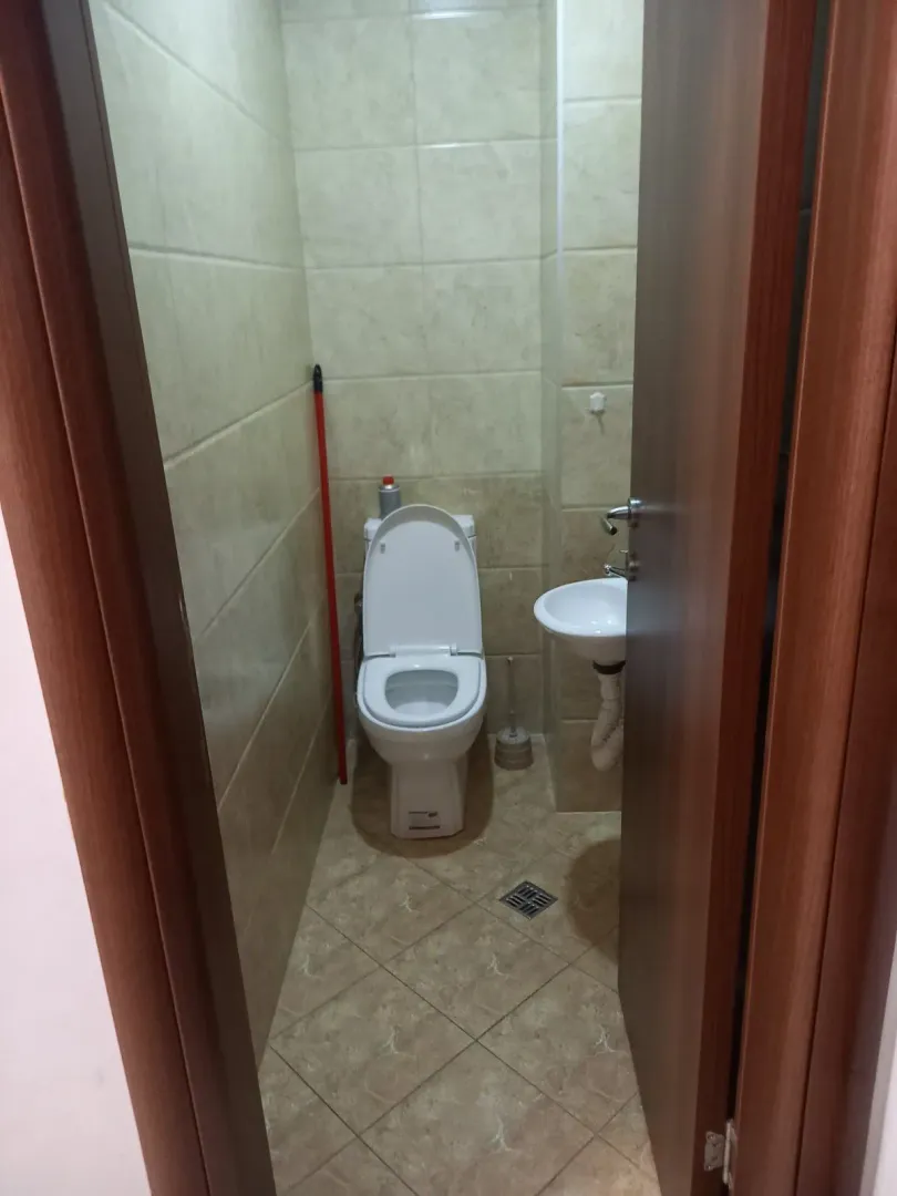 Small toilet with a sink.