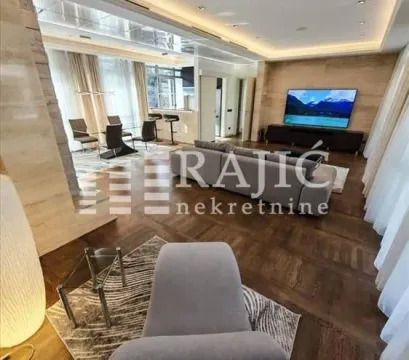 Spacious and modern living room connected to the dining area. - image 5