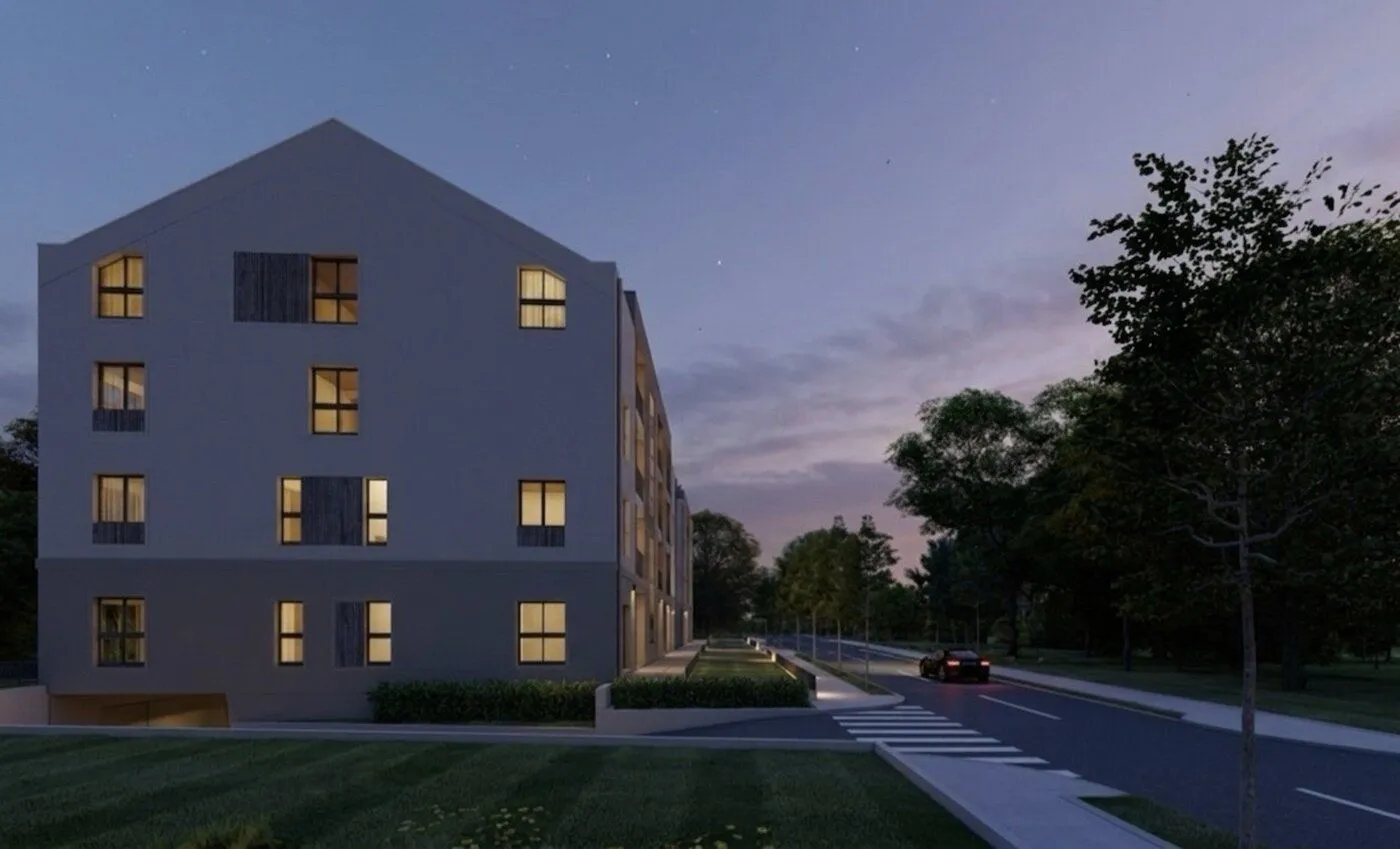 Exterior of the residential building in the evening.