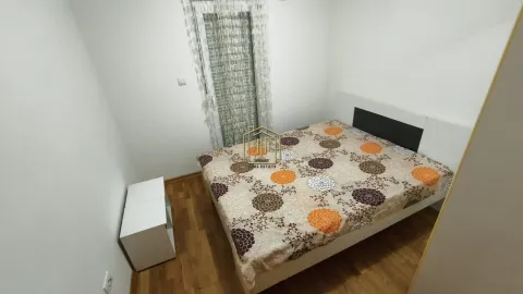 Furnished bedroom with a double bed. - image 4