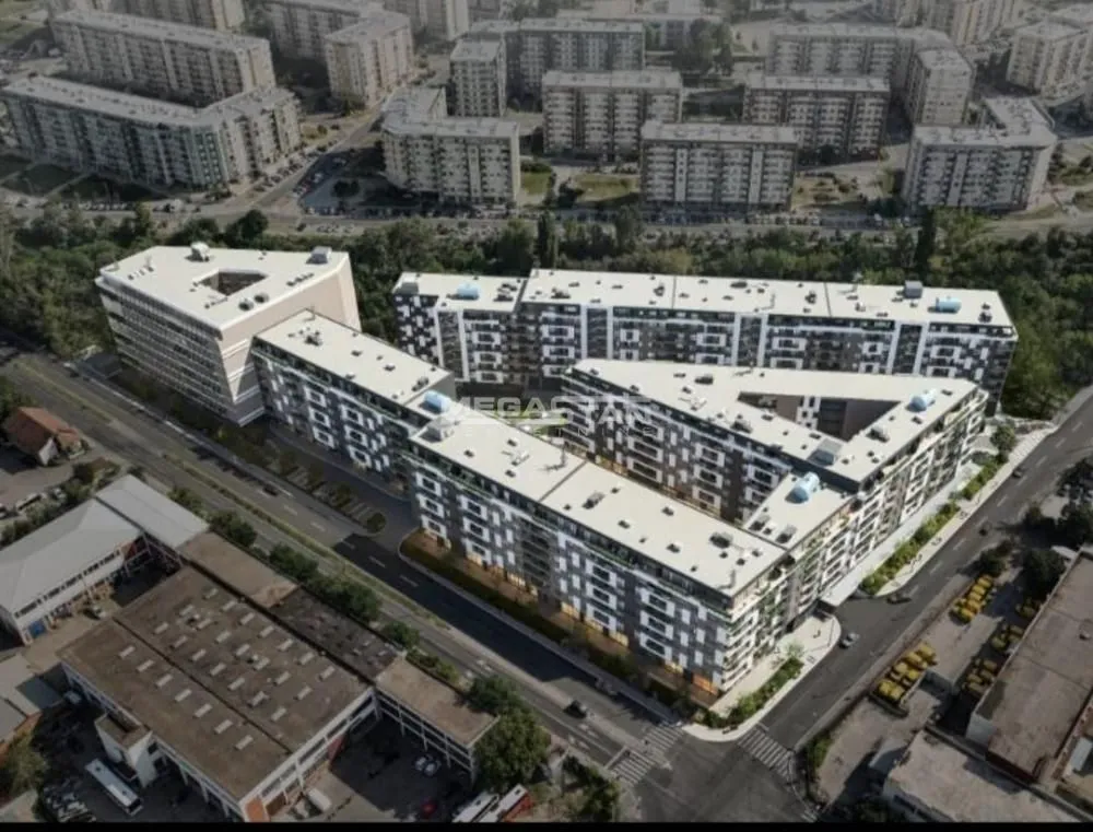 Aerial view of modern residential buildings and the surrounding neighborhood.