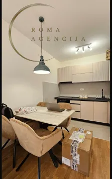 Kitchen with dining table and chairs. - image 3