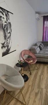Living room with sofa, armchairs and decorative details. - image 2