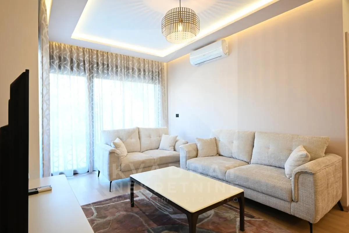 Living room with a sofa set and a coffee table.