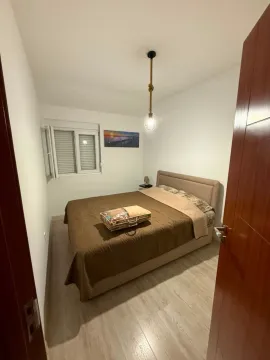 Small bedroom with a double bed and a window. - image 6