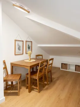 Dining table with chairs in the attic. - image 12